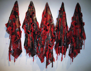 Héctor de Anda Impermeable rojo  / instalación Plástico y telas termo impresas 175cm x 245cm x 30cm 2007 